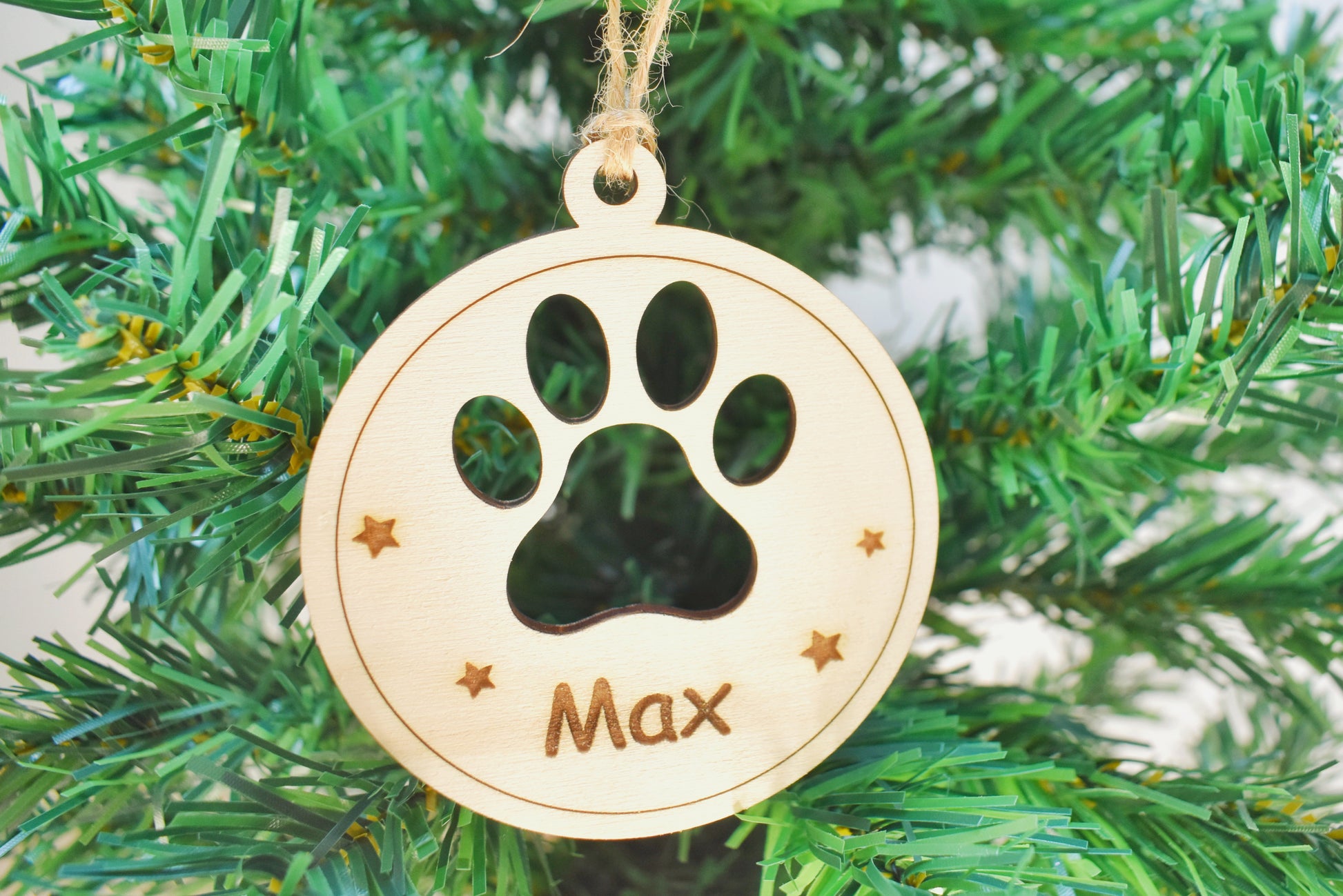 Houten kerstbal met gegraveerde naam - Pootje hond